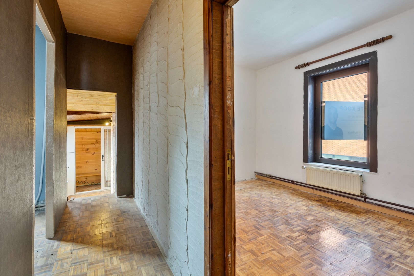 Halfopen hoekwoning met garage en dakterras op toplocatie in Kessel-Lo – renovatieproject met veel potentieel 