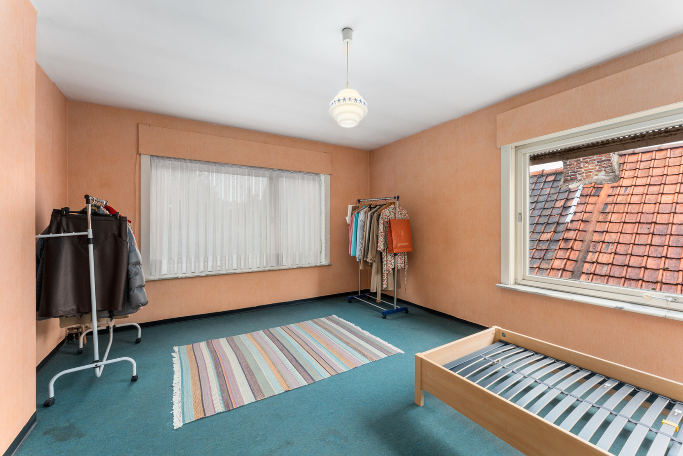 Half-open bebouwing met 4 slaapkamers en garage te centrum Ledegem 