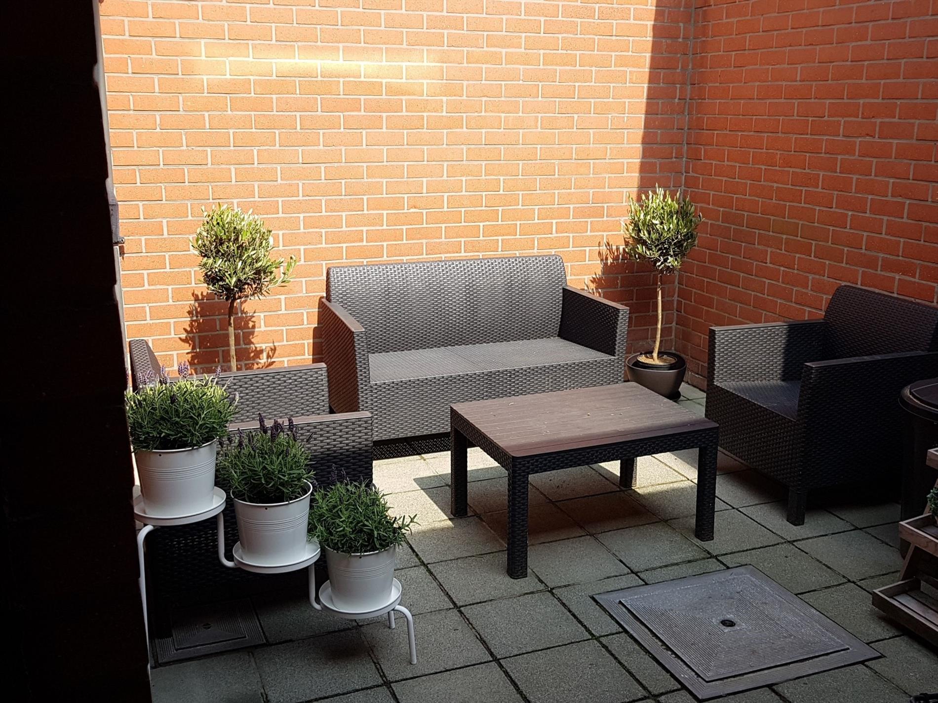 Gezellige rijwoning met terras 