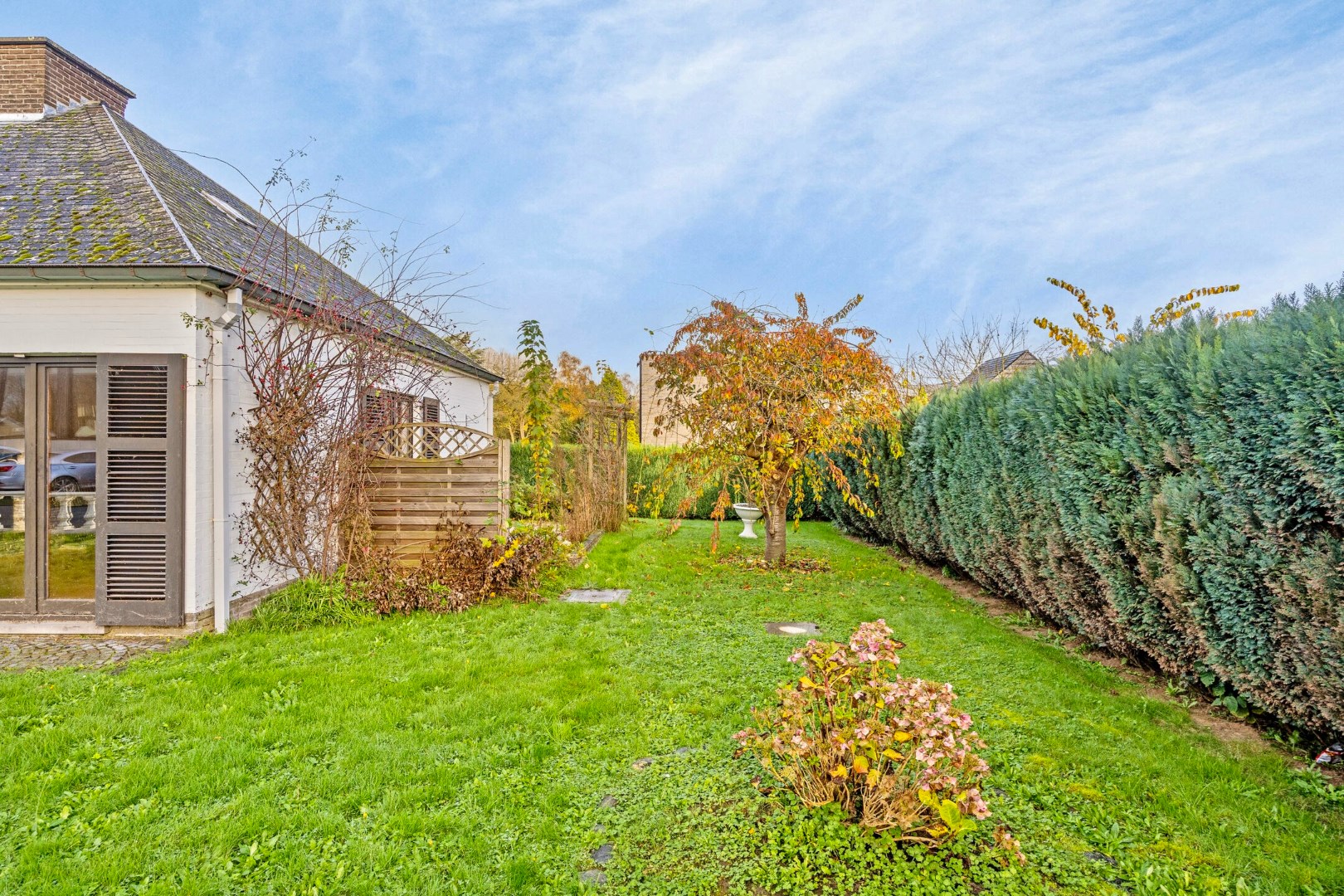 Te renoveren vrijstaande woning met 4 slpks, garage en tuin 