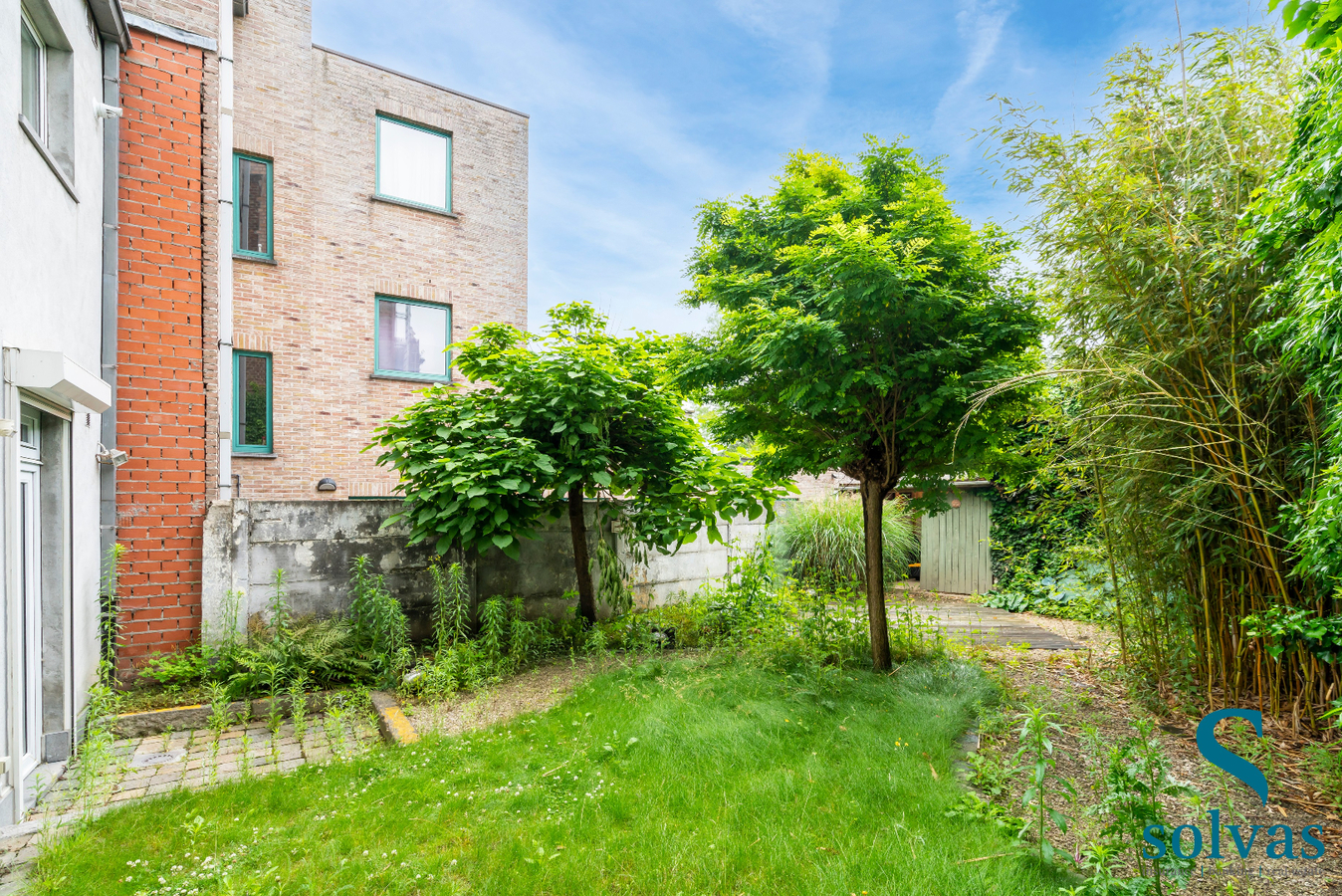 Woning met handelsruimte in hartje Zomergem 