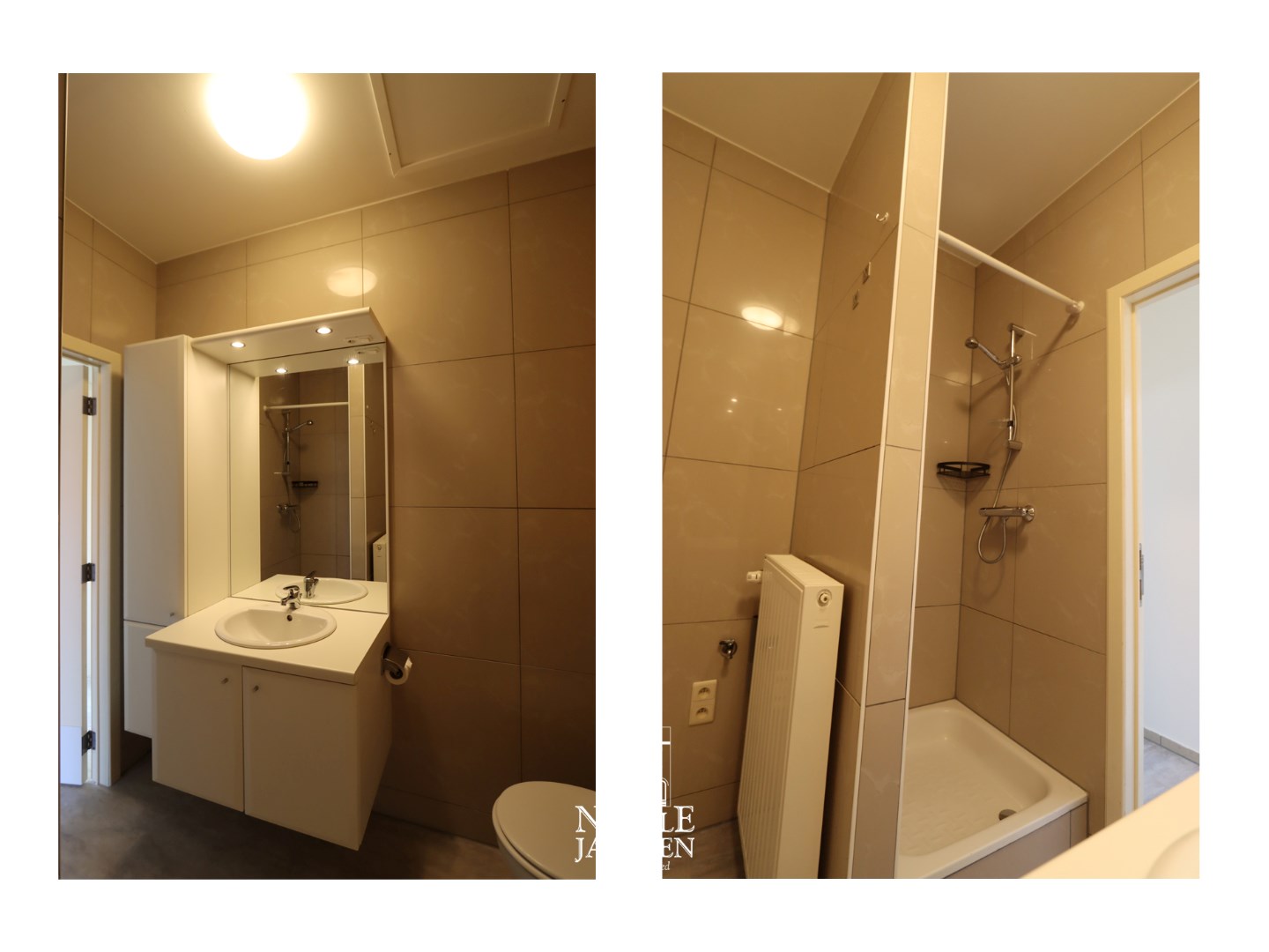 Badkamer met douche, toilet en enkele wastafel in badkamermeubel