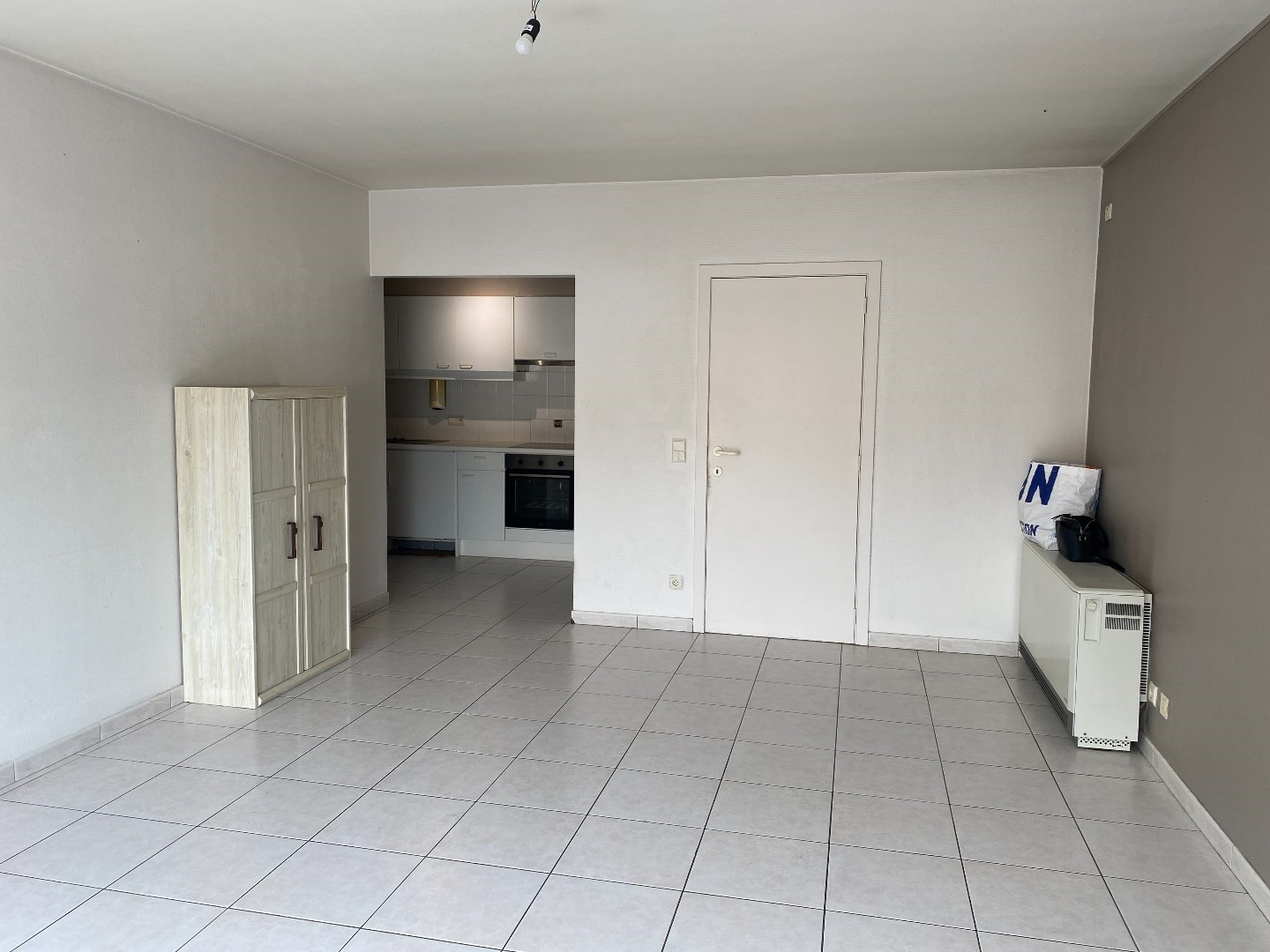 Opbrengsteigendom met 8 appartementen en 10 garages te koop in Zulte. 