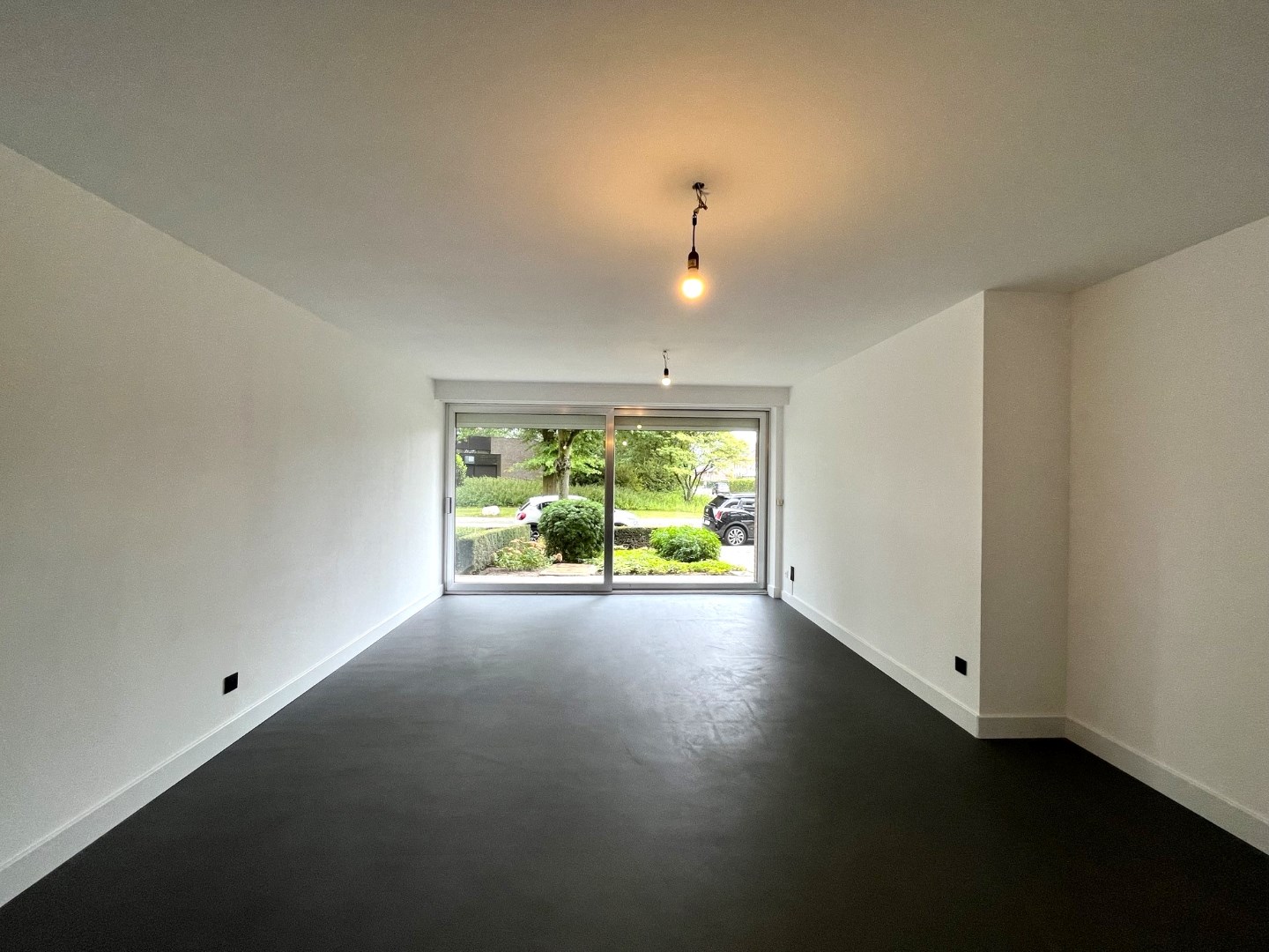 Gerenoveerd gelijkvloers appartement met tuin en garage in Geel 