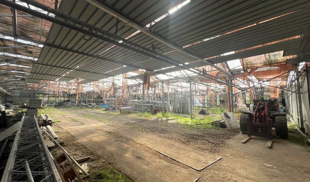 Agrarische grond met serres te koop in Merelbeke