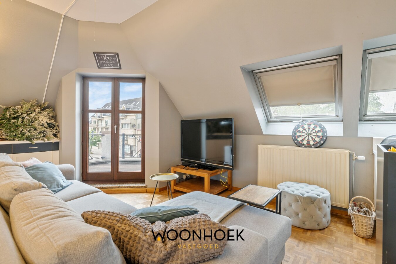 Centraal gelegen woning met handelsruimte te Lokeren 