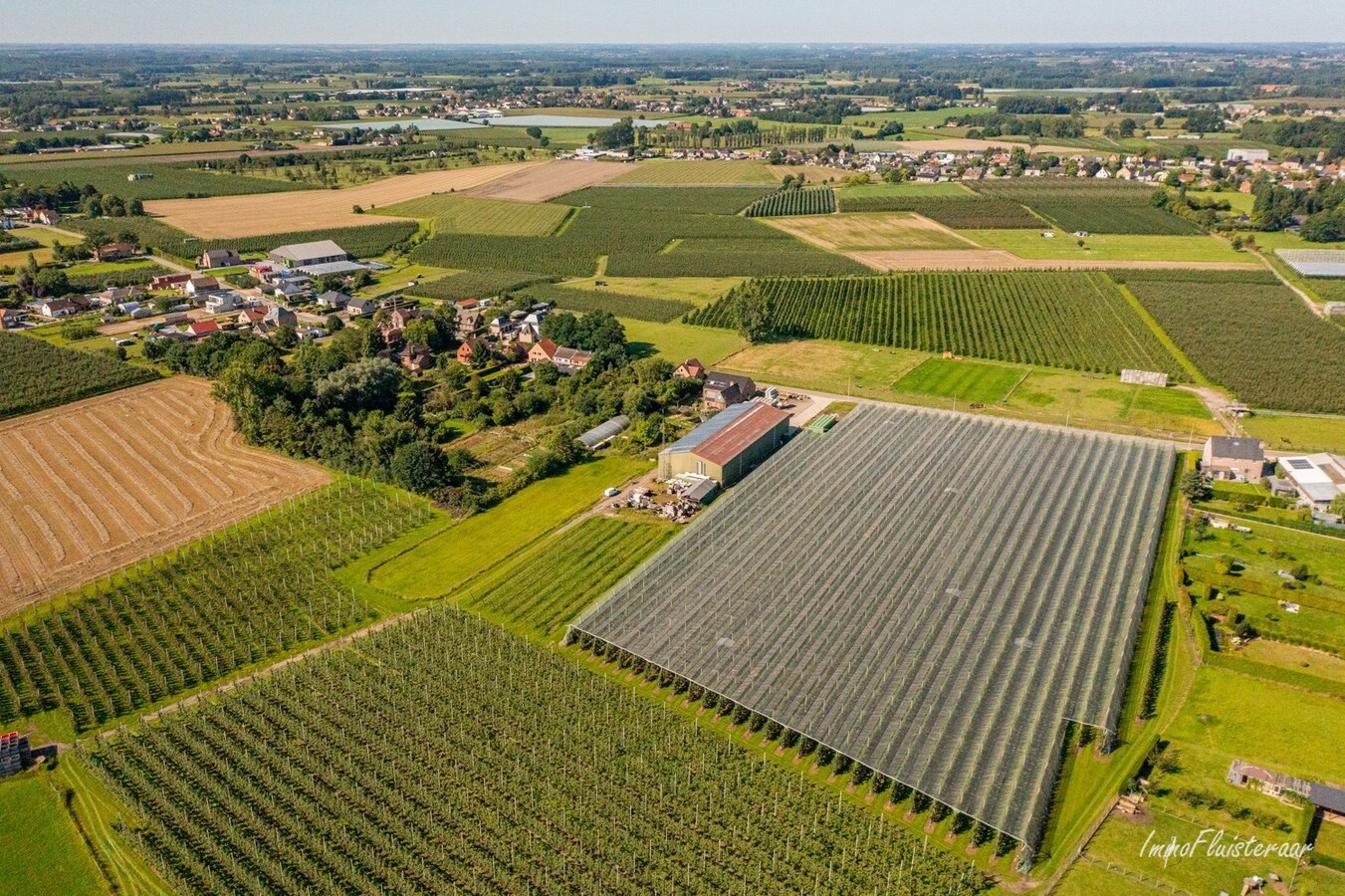 Bouwgrond met loods op ca. 54 are te Herk-de-Stad 