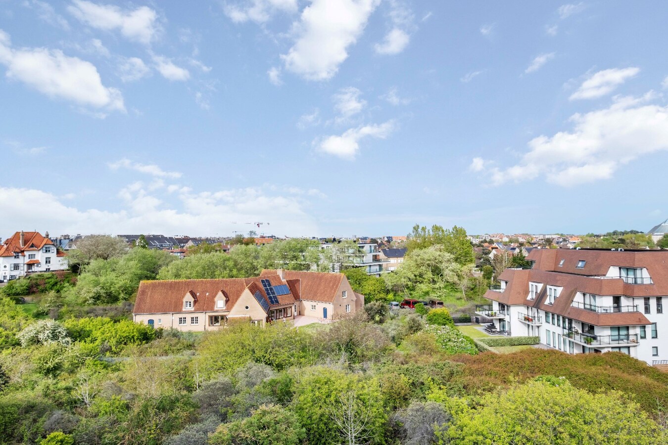 Penthouse met zuidgericht terras vlakbij het strand 