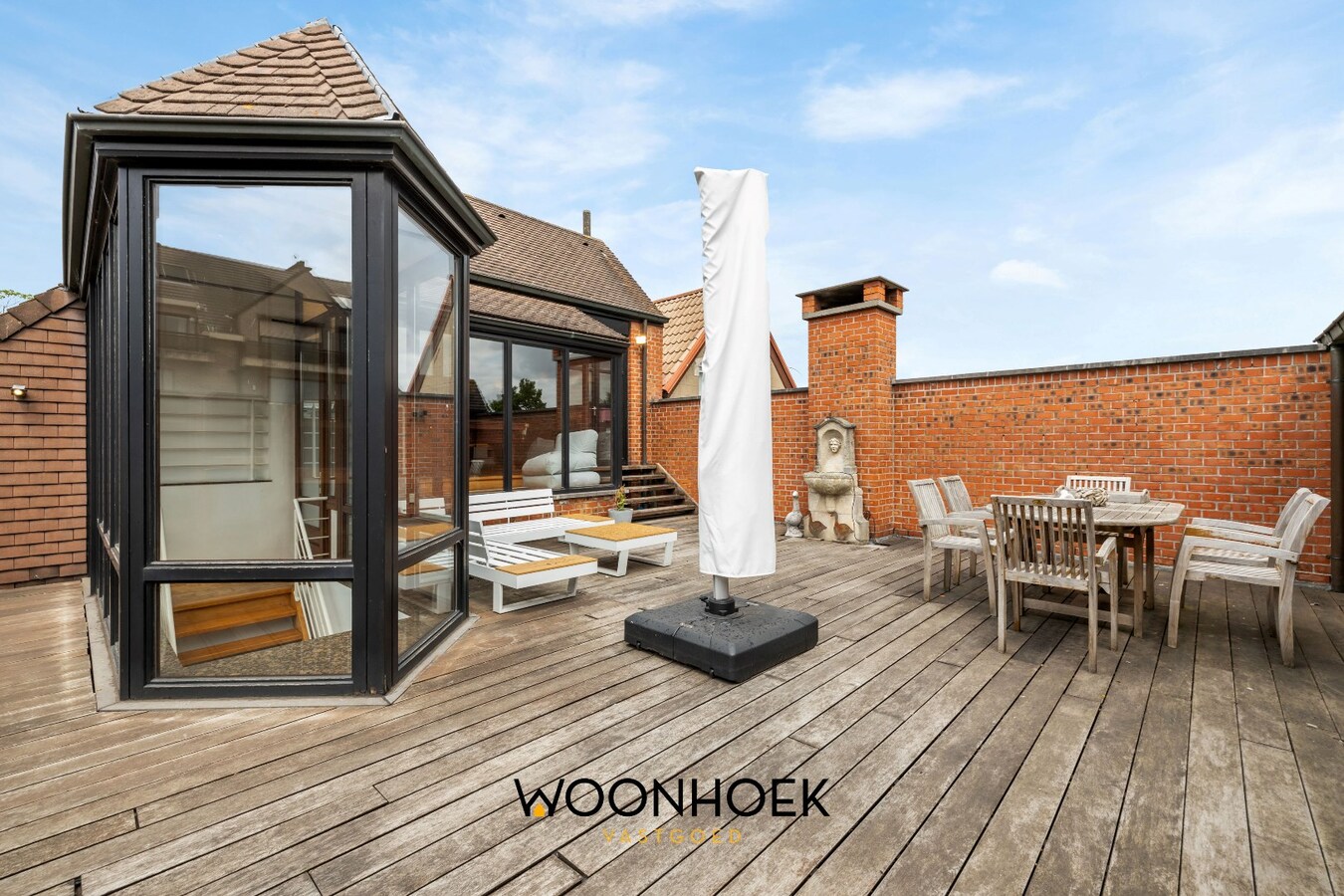 Centraal gelegen woning met handelsruimte te Lokeren 