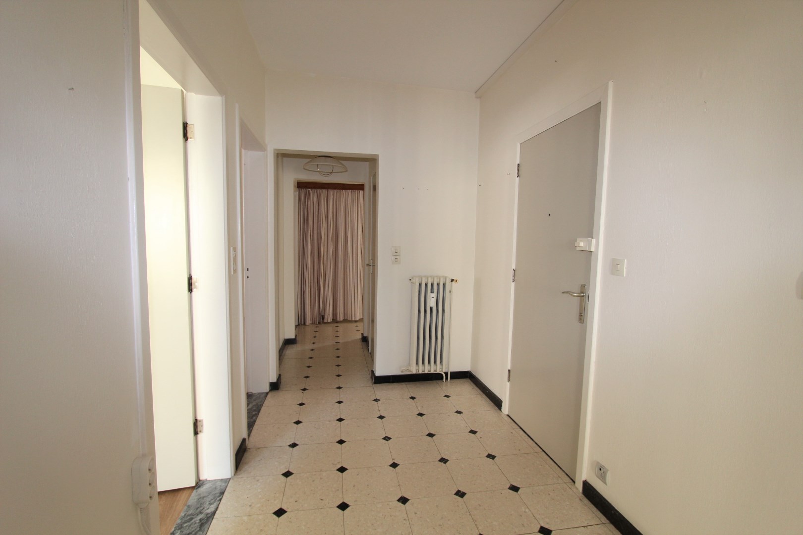RUIM APPARTEMENT - PRACHTIG GELEGEN IN HET STADSCENTRUM 
