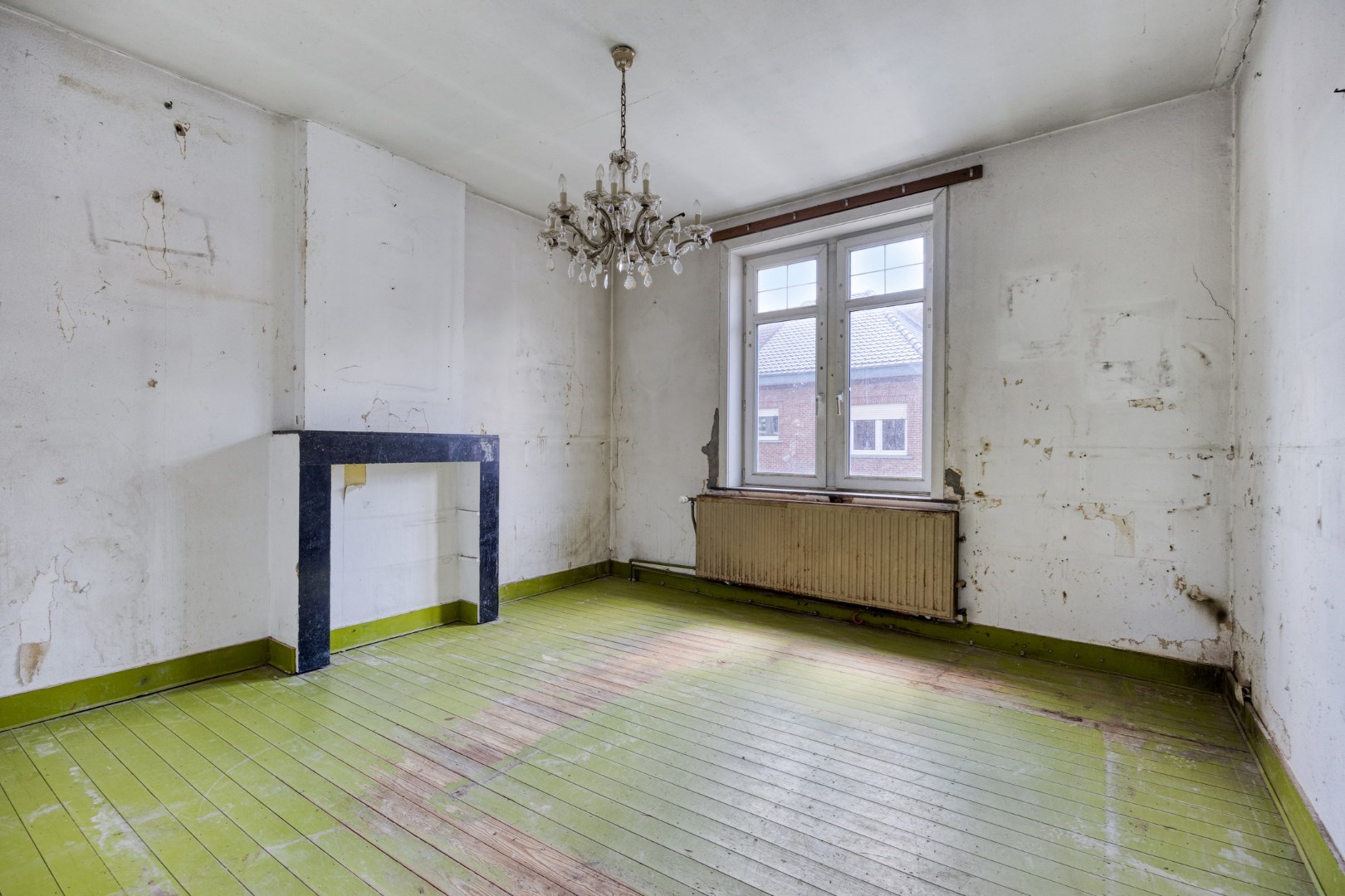 Te renoveren halfopen bebouwing met 3 slaapkamers en ruime tuin in hartje Kessel-Lo 