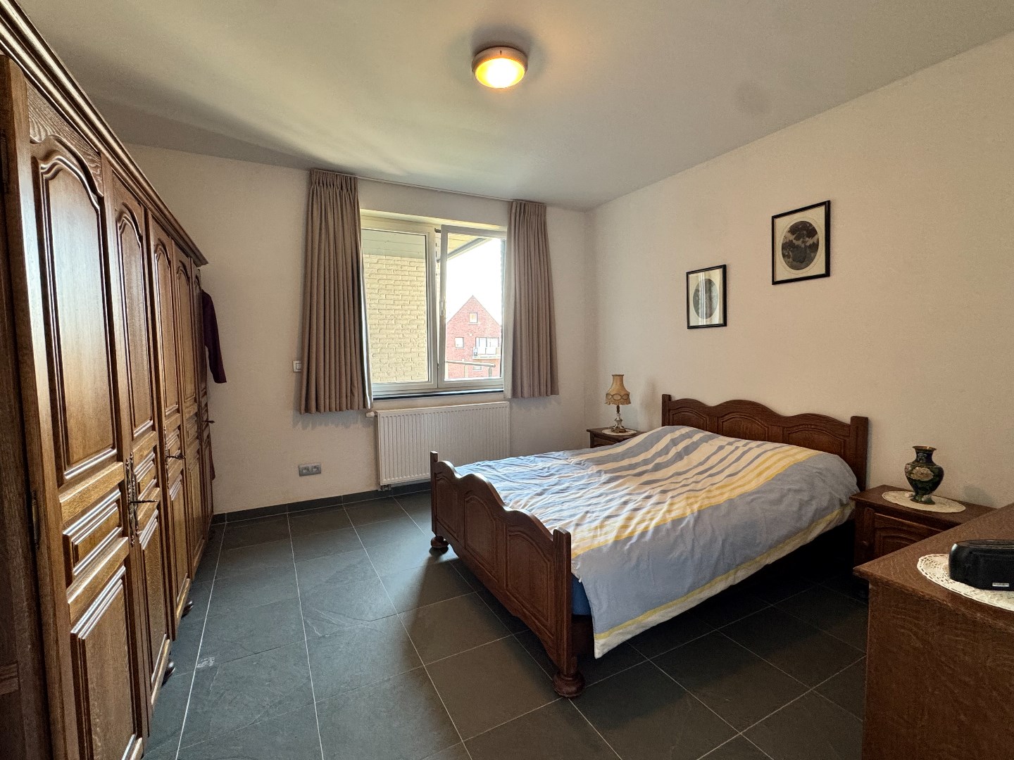 Ruim appartement met ondergrondse garage te koop in hartje Zulte 