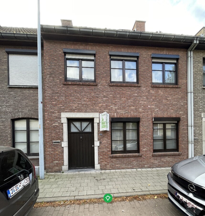 Gezellige rijwoning met 3 slaapkamers, terrastuin en garage te Kachtem 