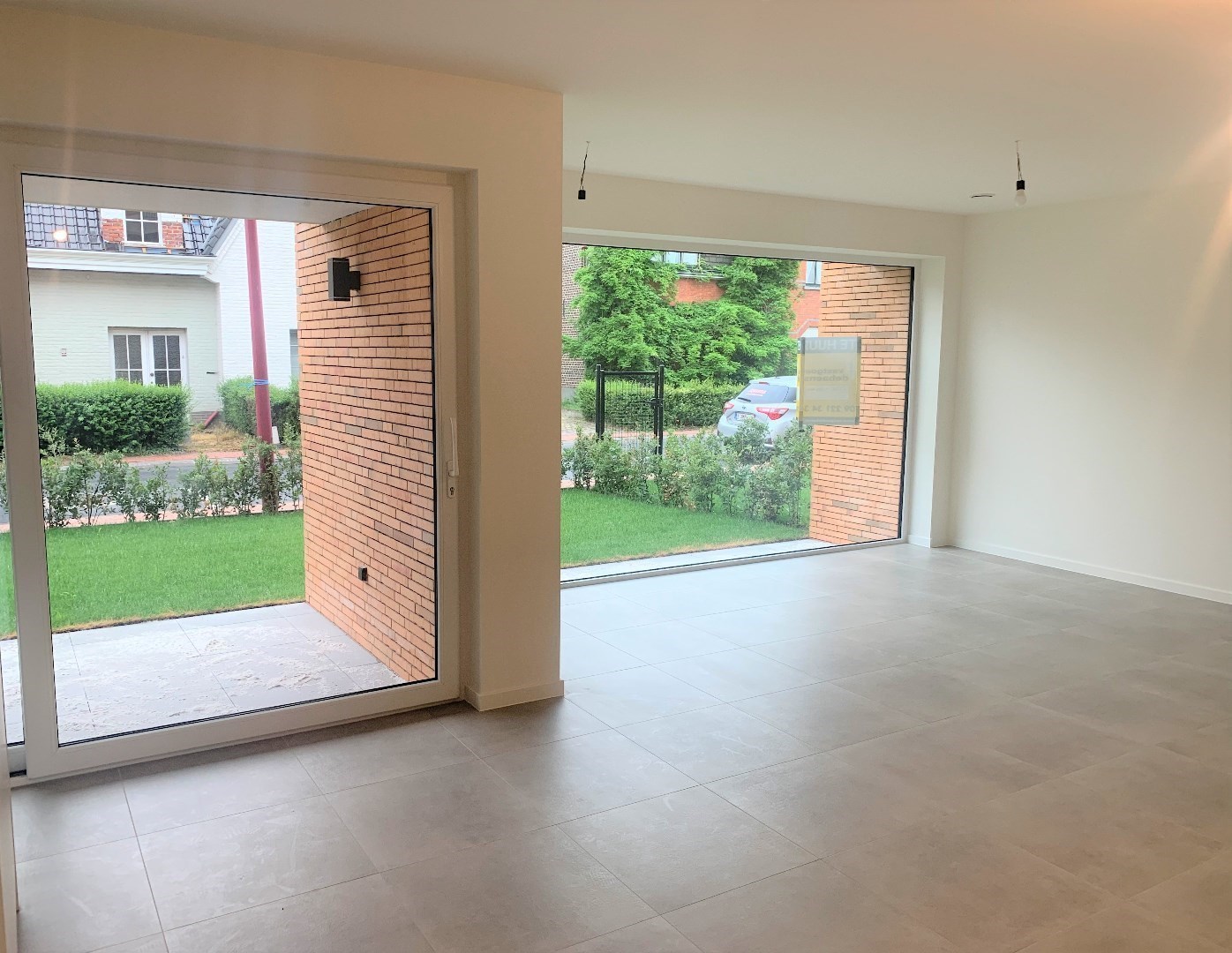 Rustig gelegen 2-slaapkamer appartement met open staanplaats 