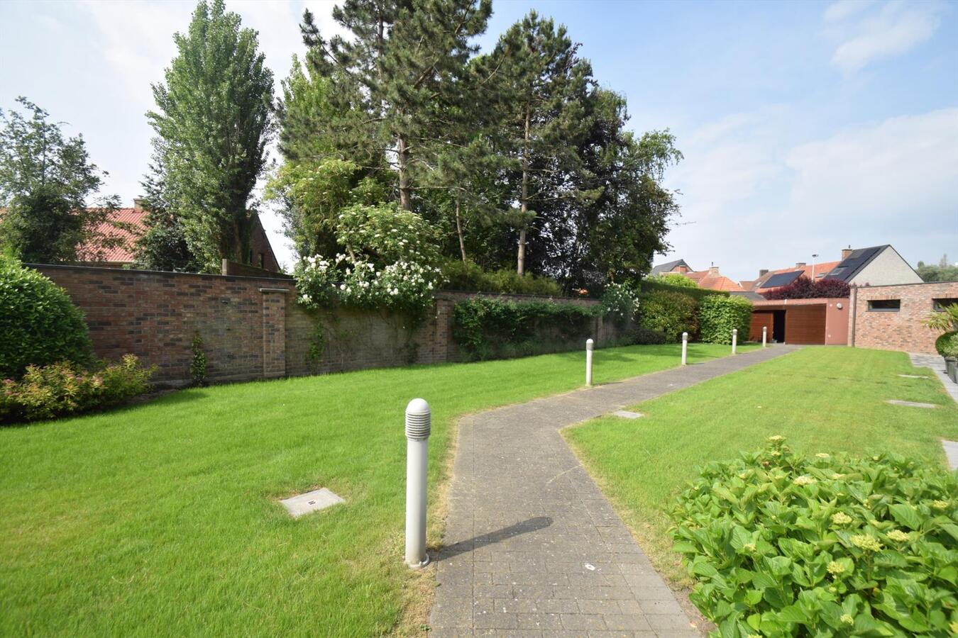 Ruim en comfortabel appartement op gelijkvloers met zonnig terras uitgevend op gemeenschappelijke tuin 