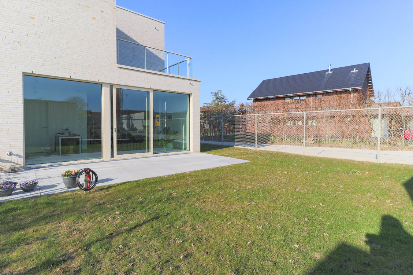 Moderne nieuwbouwwoningen met garage in groene omgeving te Kuurne 