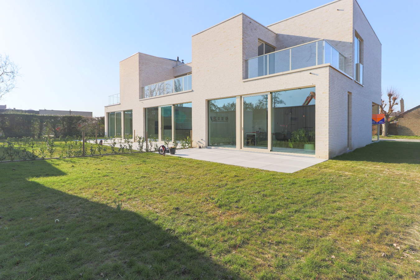 Moderne nieuwbouwwoningen met garage in groene omgeving te Kuurne 