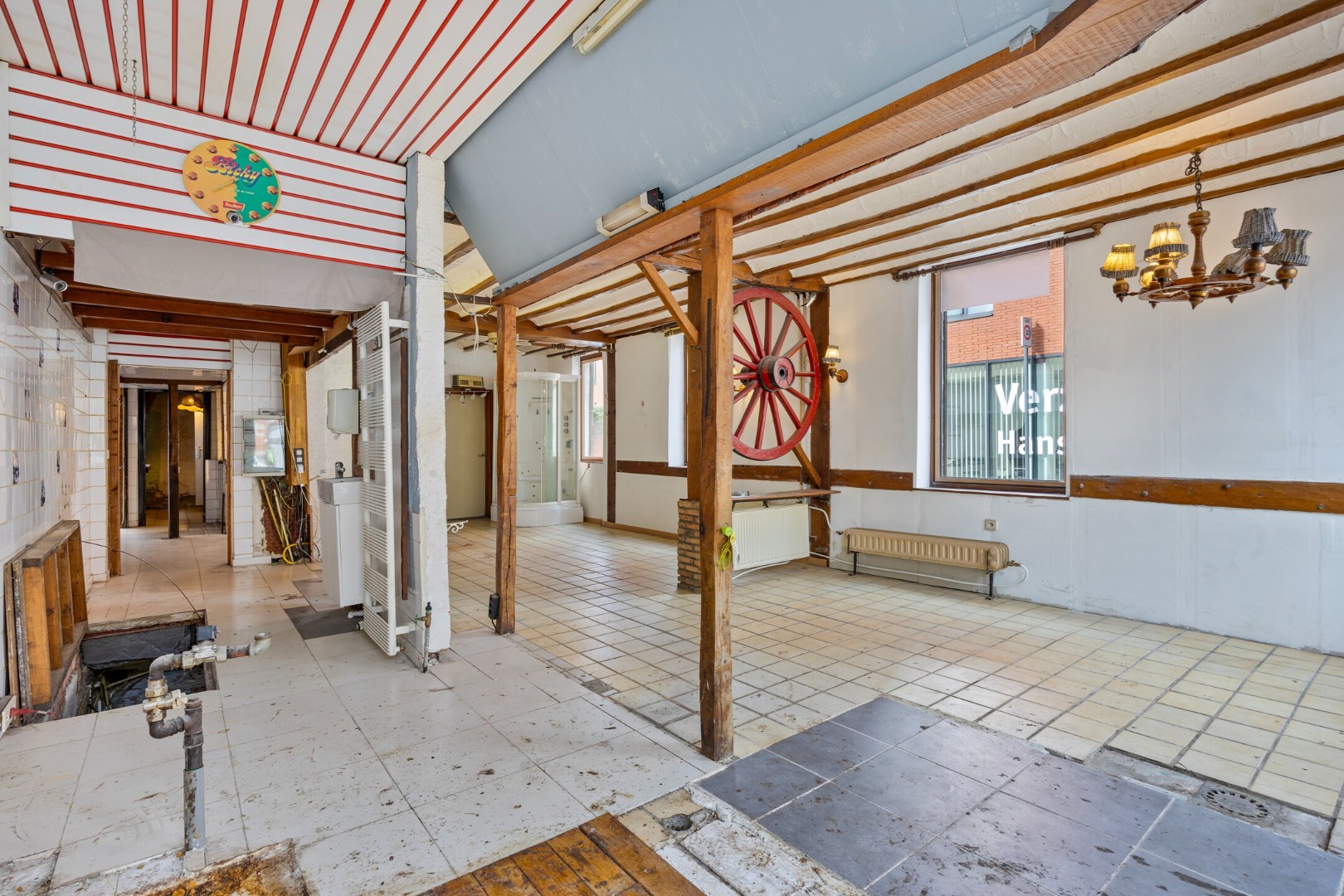 Halfopen hoekwoning met garage en dakterras op toplocatie in Kessel-Lo – renovatieproject met veel potentieel 