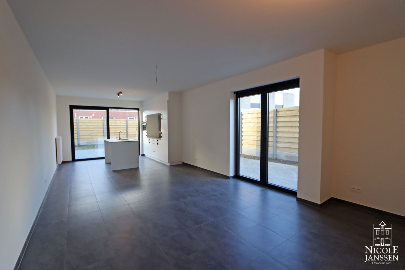 Nieuwbouw appartement met twee slaapkamers, gezellig terras, autostandplaats en ruime berging in Molenbeersel 