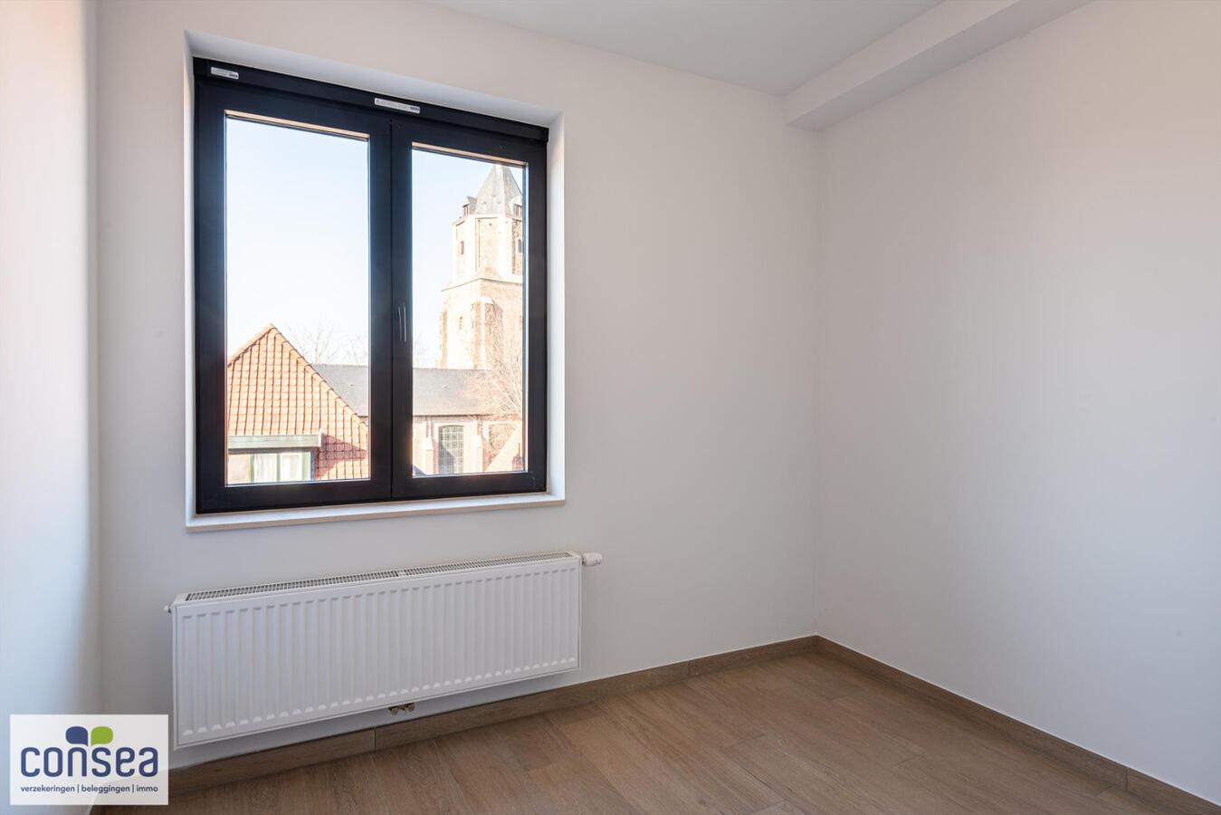 Lichtrijk appartement in het centrum van Maldegem met zicht op de kerk en overdekt terras van 15m&#178; 