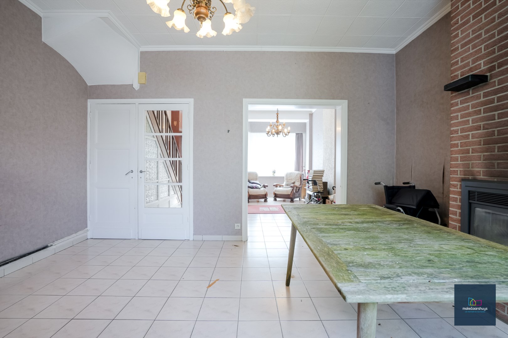 Centraal gelegen te renoveren woning in rij met tuin te Mariakerke 