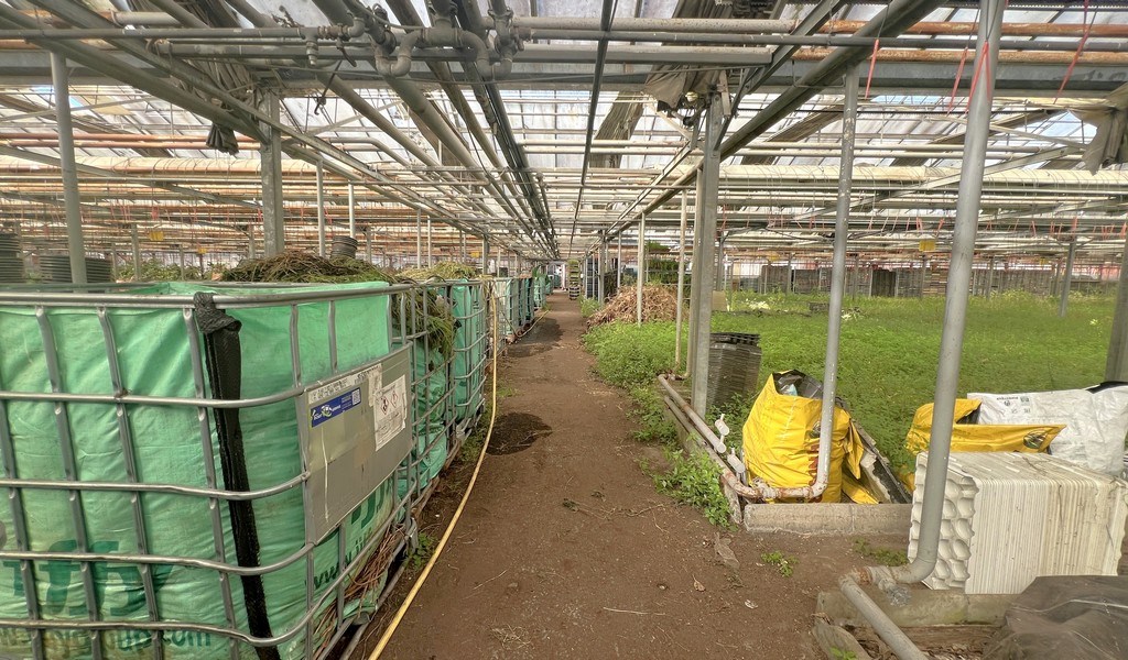 Agrarische grond met serres te koop in Merelbeke