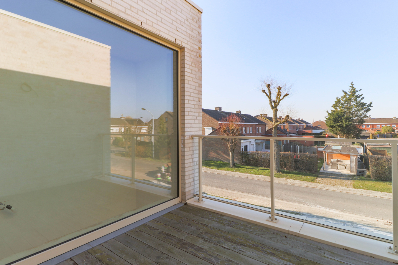 Moderne nieuwbouwwoningen met garage in groene omgeving te Kuurne 