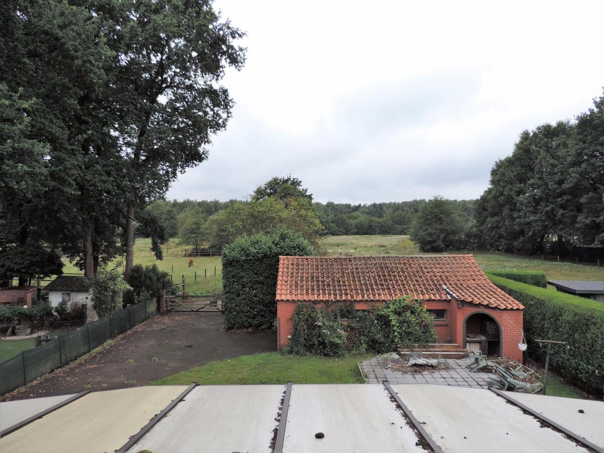 Gezinswoning met grote garage en stallen op ca. 92are te Heusden-Zolder 