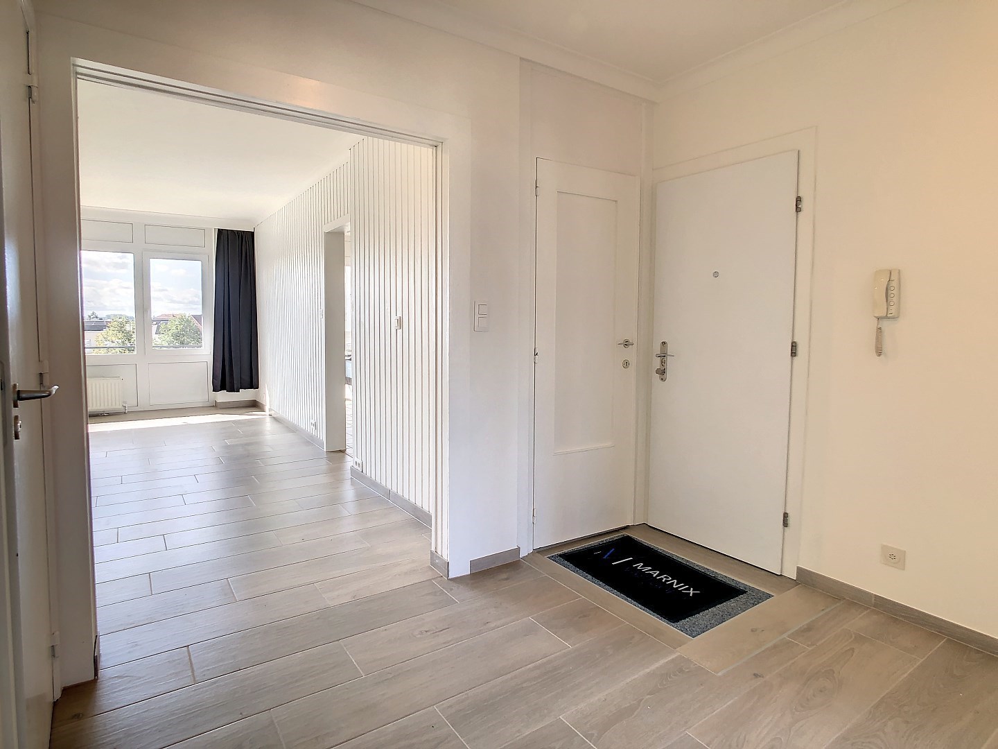 Gerenoveerd appartement met 2 slaapkamers en terras en garagebox - bewoonbare oppervlakte 78 m&#178; 