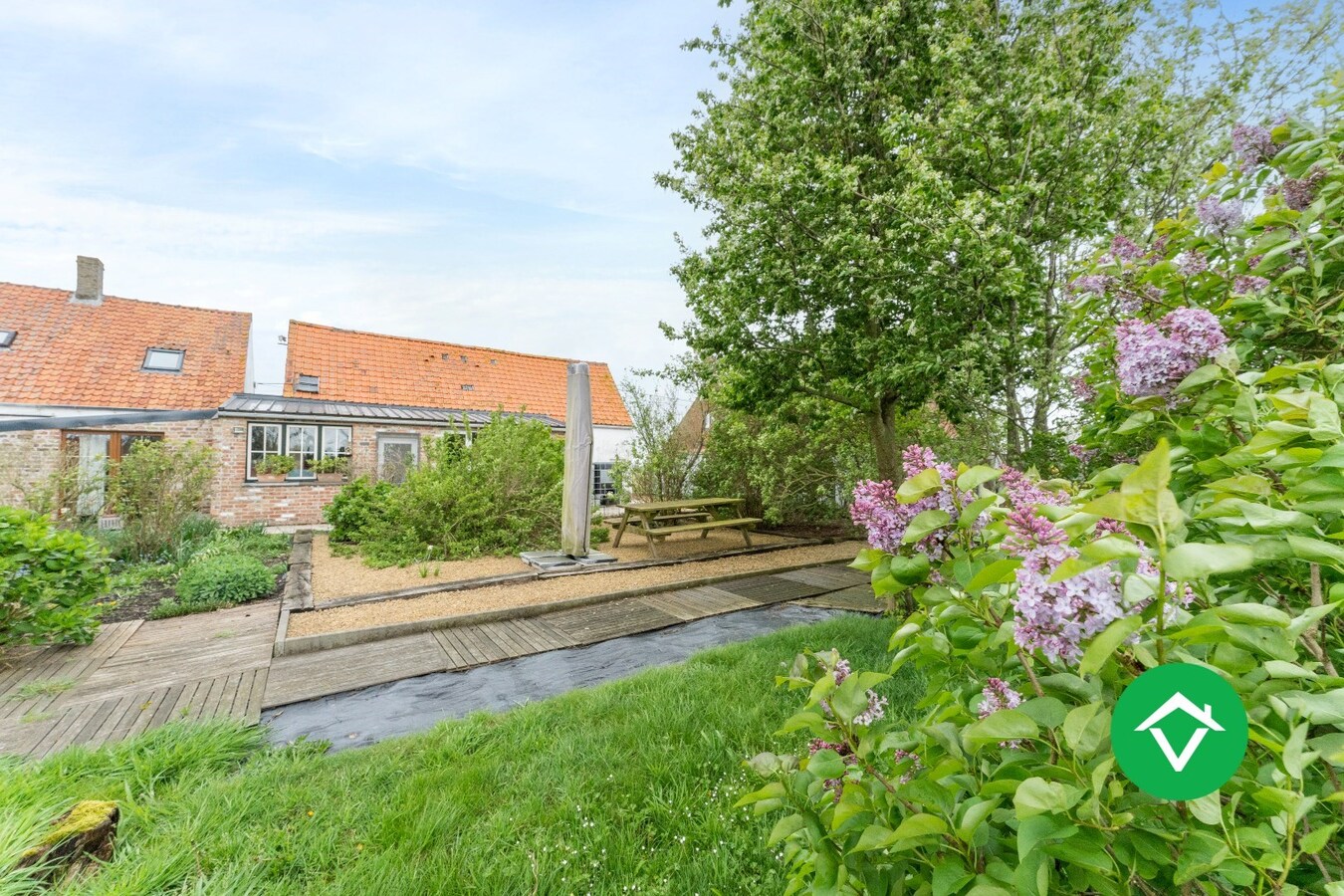 Alleenstaande woning met 4 slaapkamers en dubbele garage te Keiem 