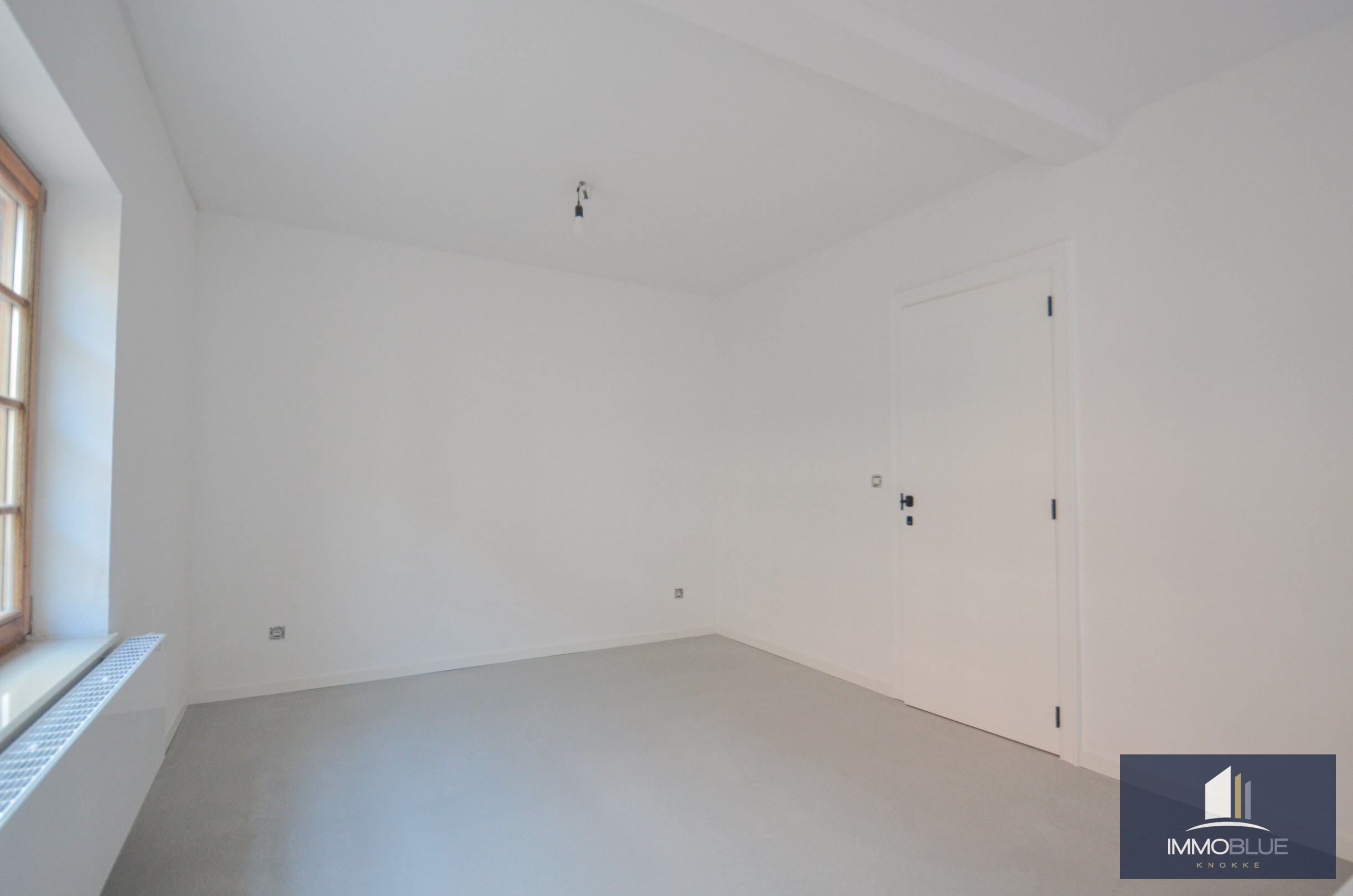 EXCLUSIEF : Tuinappartement gelegen in een kleinschalige nieuwbouwresidentie in Art Deco-stijl. 