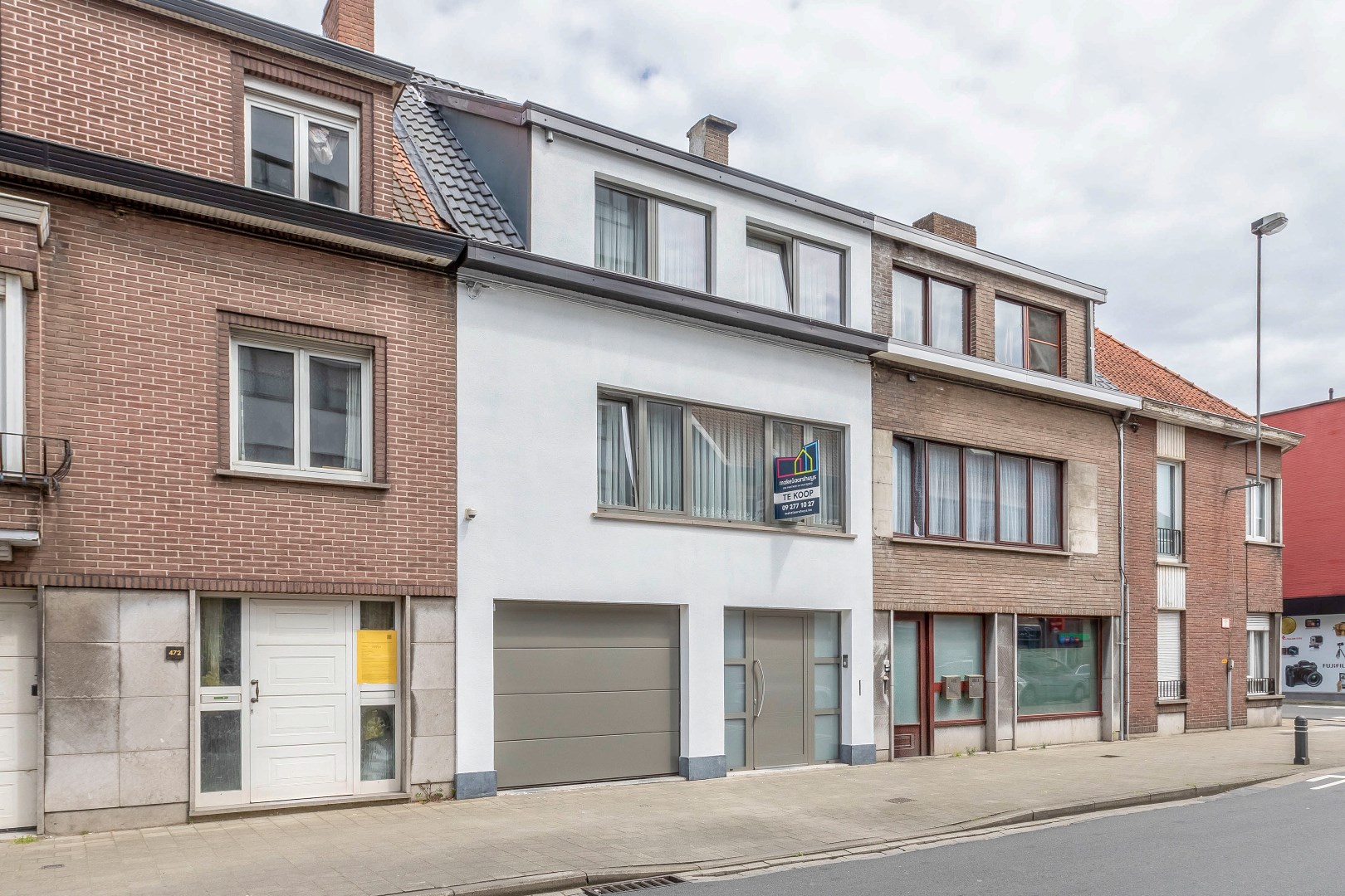 Volledig gerenoveerde woning met garage en terras/koer in het centrum 