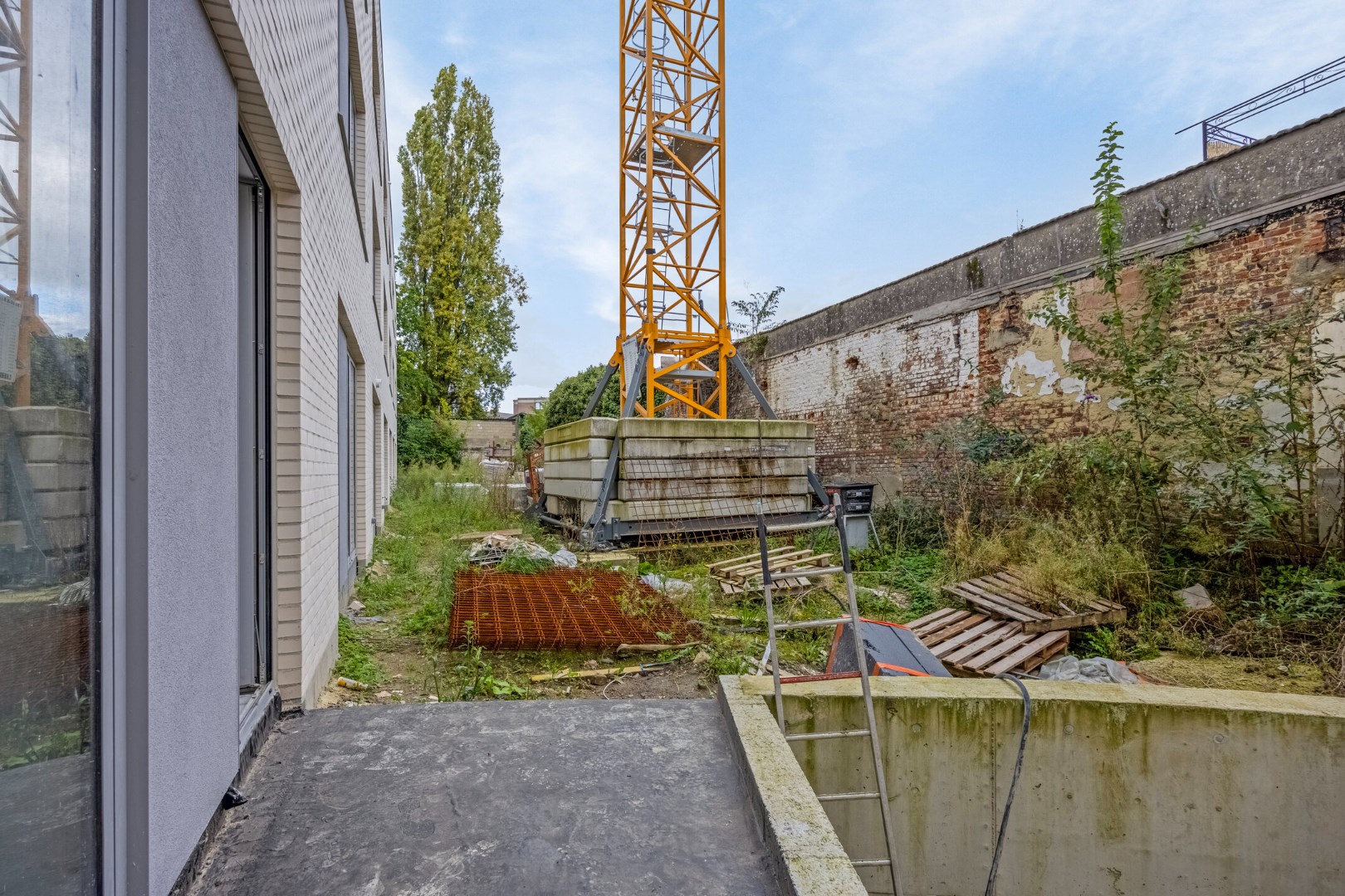 Nieuwbouwappartement met 2 slaapkamers, priv&#233;-tuin en staanplaats – verkoop onder registratierechten of BTW-stelsel 