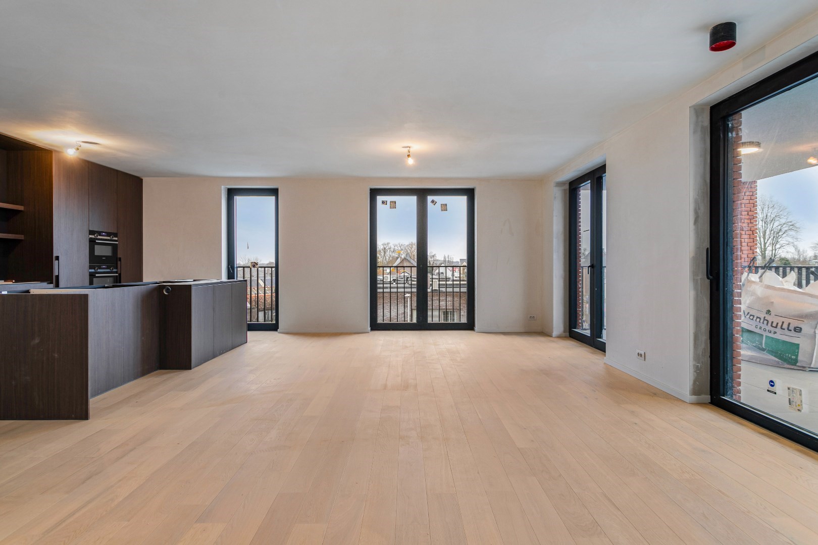 Nieuwbouwappartement met twee slaapkamers, terras en ondergrondse autostaanplaats te koop in Zulte 