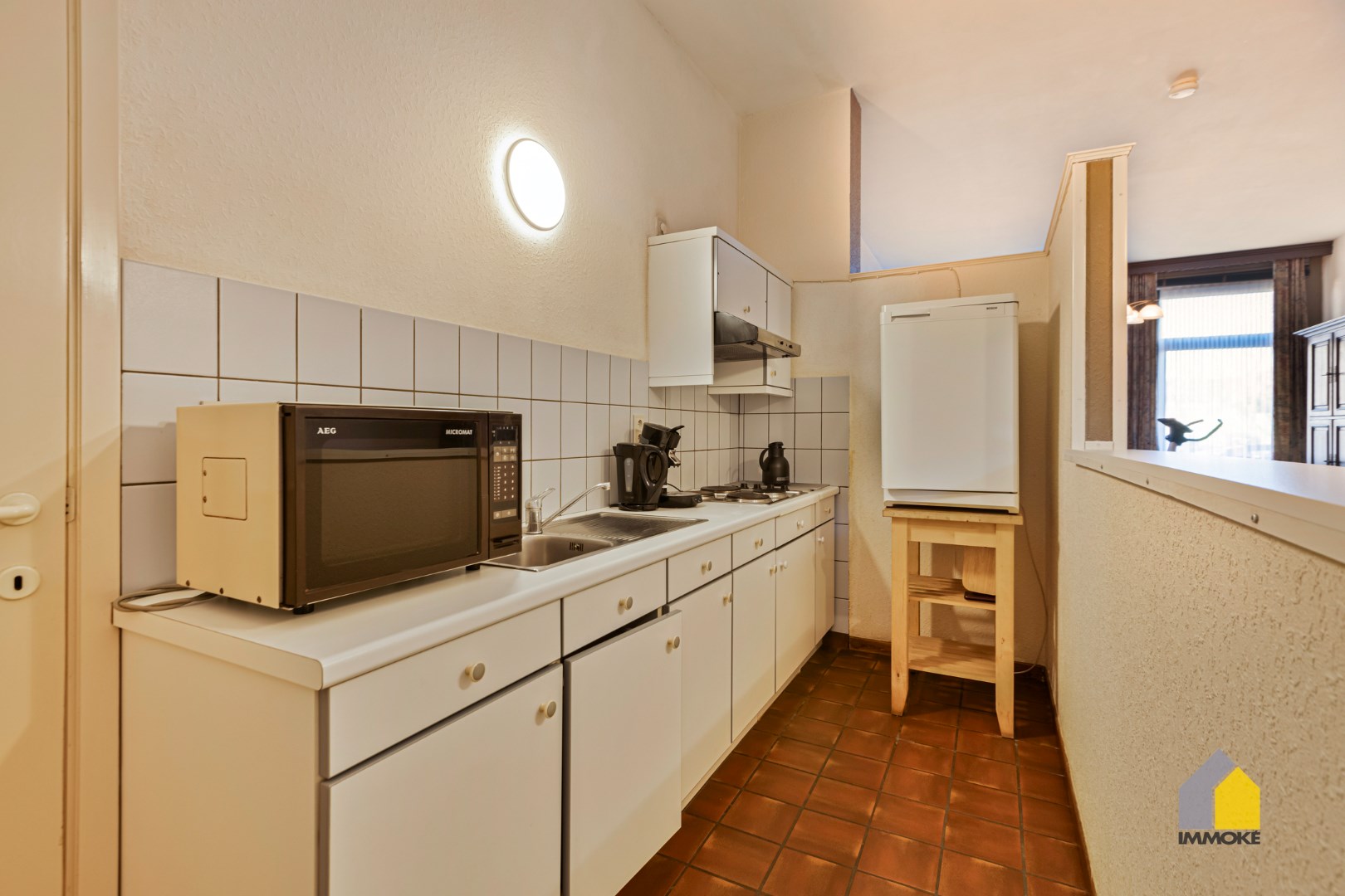 Gelijkvloers appartement (89 m&#178;) met 2 slaapkamers, stadstuintje en kelderberging. 