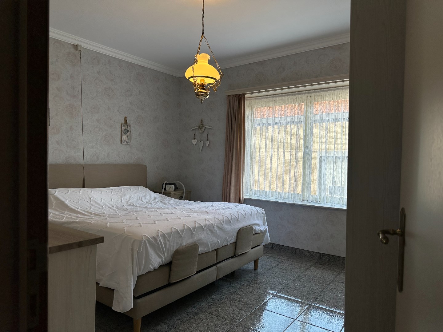 Ruime woning met aangebouwde bijruimte te Desselgem 