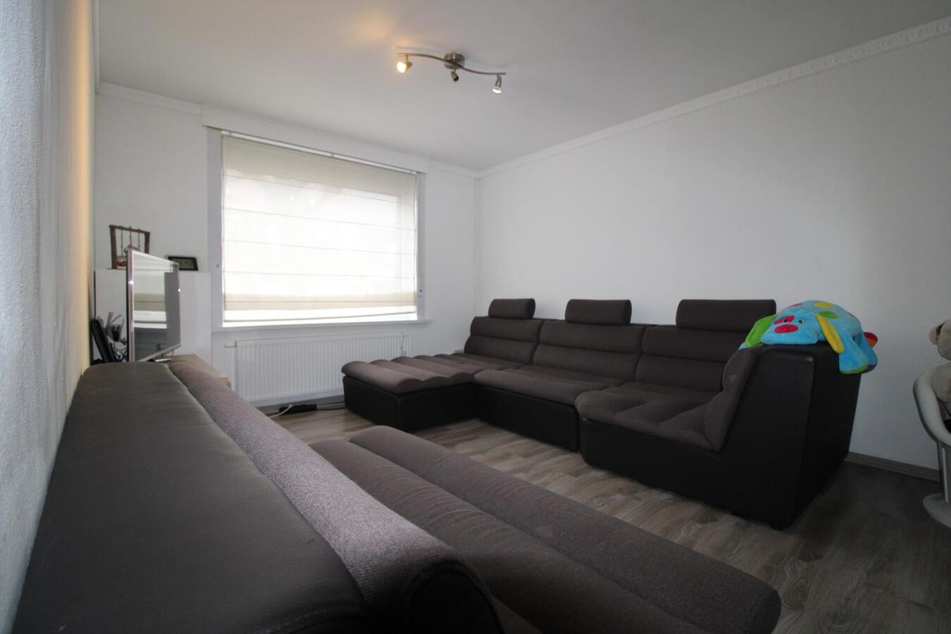 Welgelegen, comfortabel woonhuis met aangename tuin, nabij winkels 