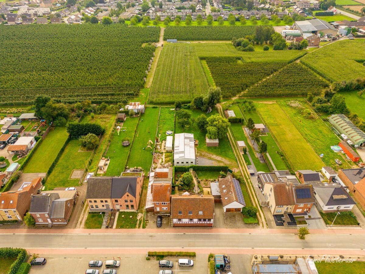 Ruime woning met bijgebouw en een loods op ca. 25 are te Kortessem 