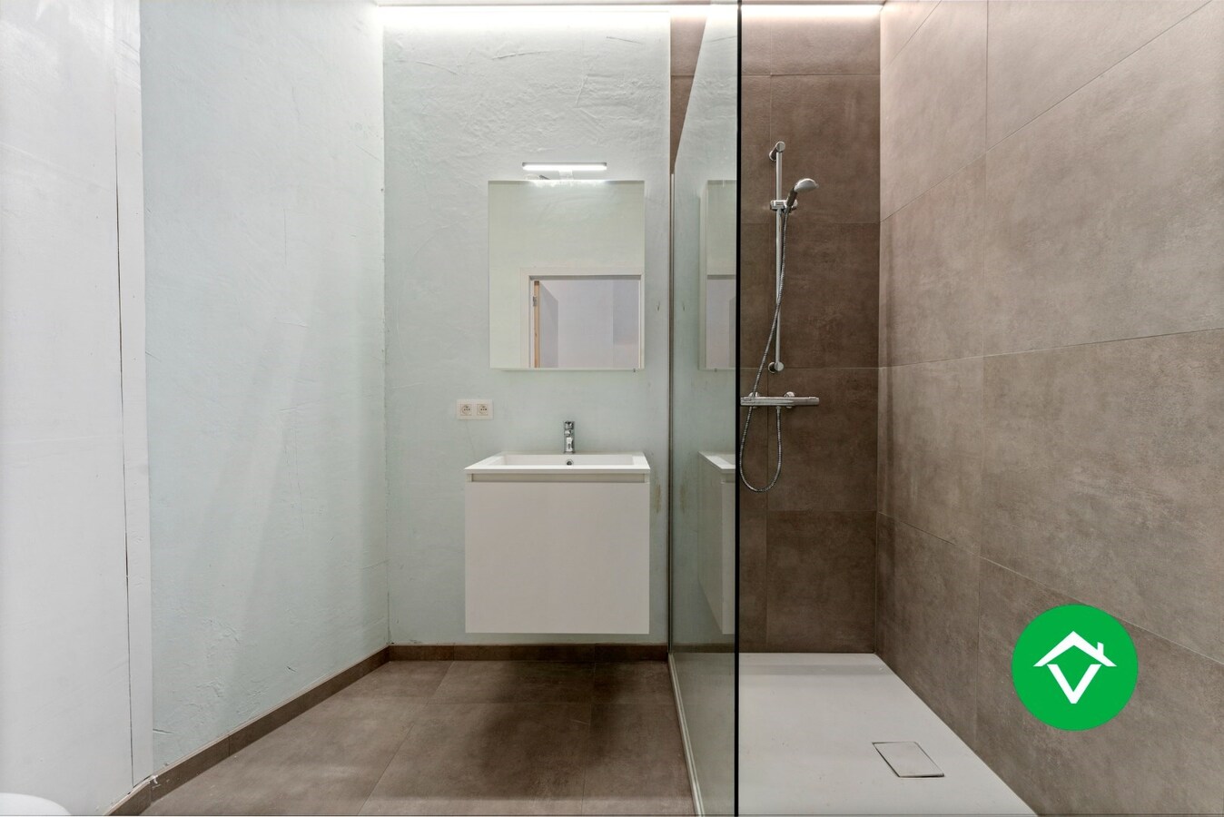 Gelijkvloers appartement met garage te Leke 