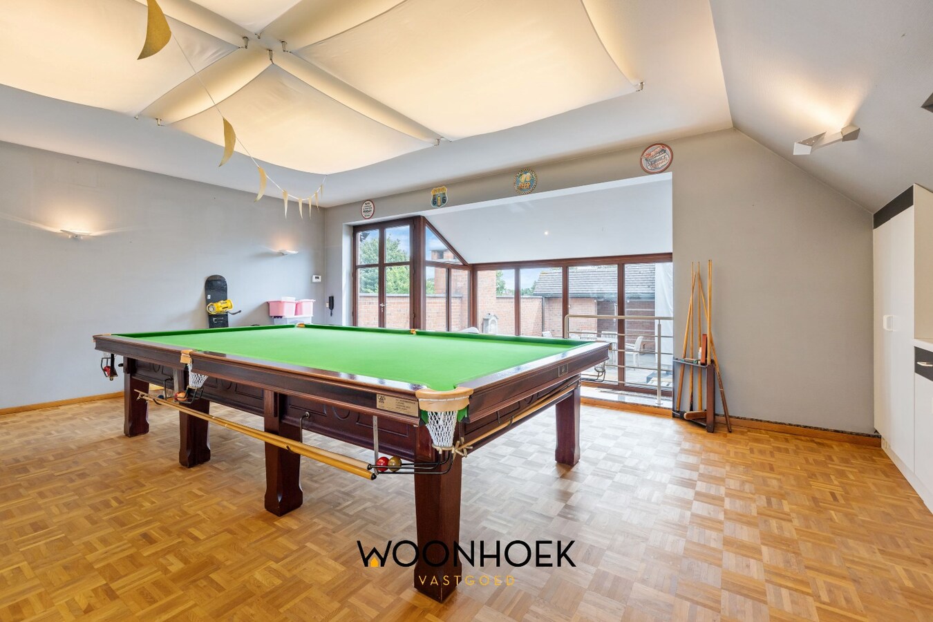 Centraal gelegen woning met handelsruimte te Lokeren 