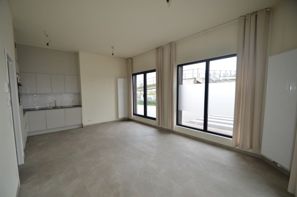 Gelijkvloers appartement met 2 slpks 