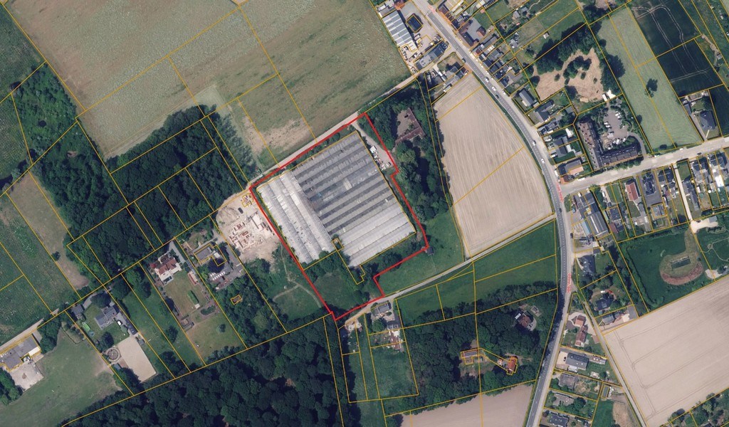 Agrarische grond met serres te koop in Merelbeke