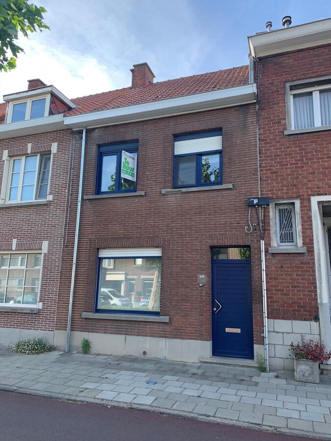 Welgelegen, comfortabel woonhuis met aangename tuin, nabij winkels 
