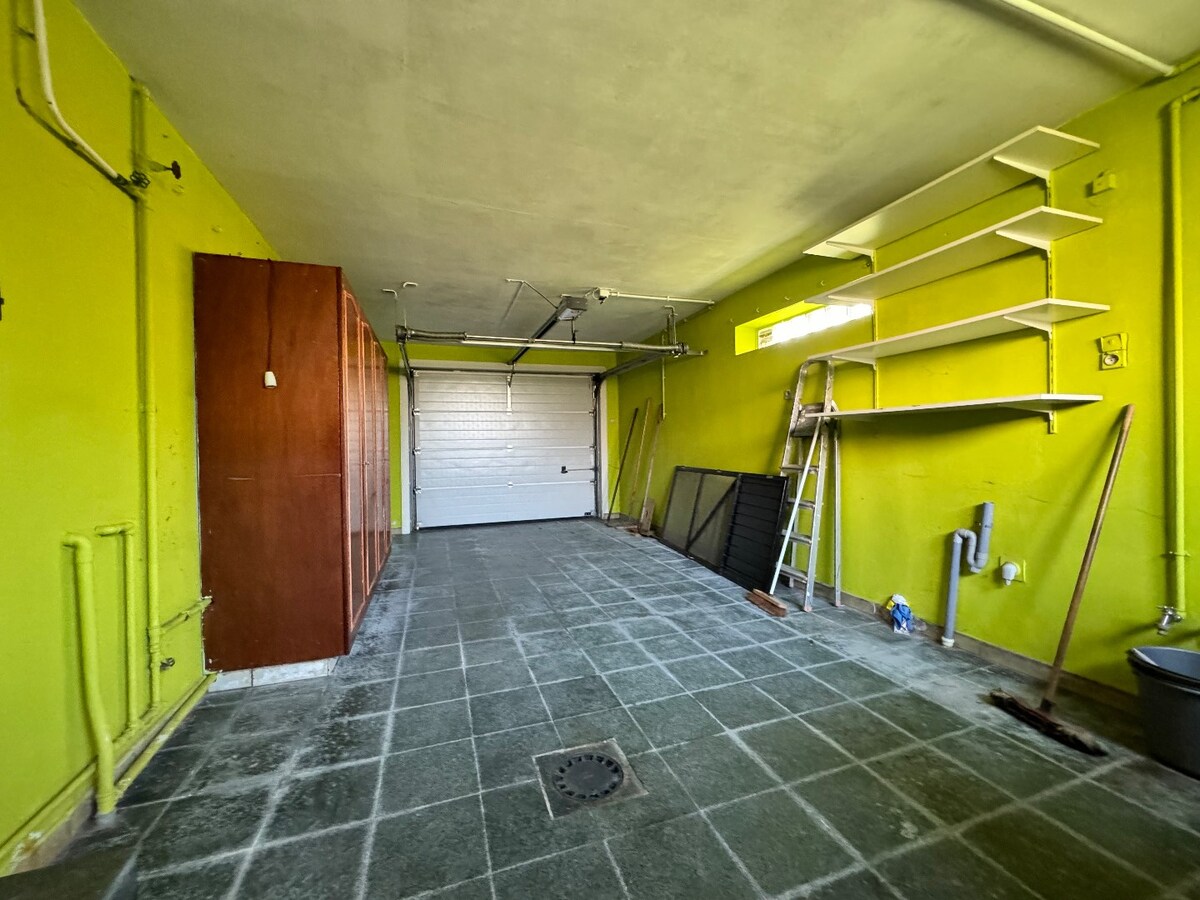 Alleenstaande woning met 4 slaapkamers en garage te Westende 
