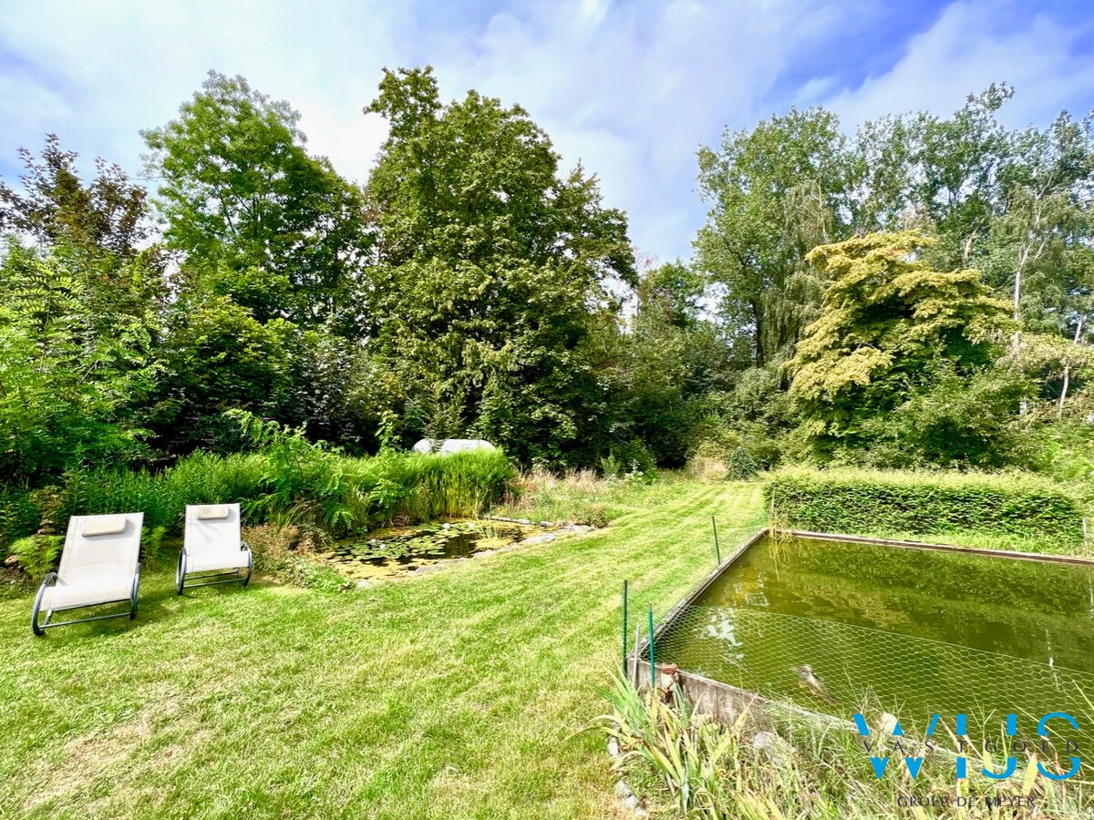 Idyllisch gelegen hoeve op 6.802 m&#178; te ASSENEDE ! 