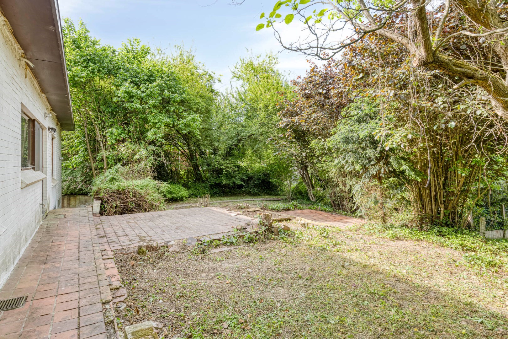 Ruime gezinswoning met 5 slaapkamers, praktijkruimte en dubbele garage in Kessel-Lo – EPC 337 kWh/m&#178; – bewoonbare oppervlakte ca. 301 m&#178; 