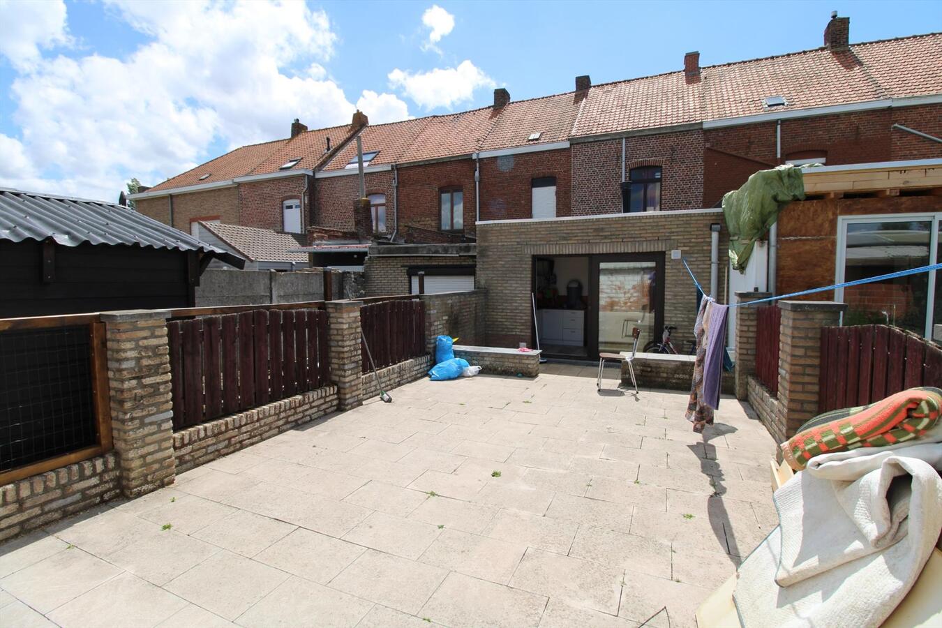 Rijwoning met terrastuin en 2 slaapkamers te Menen 