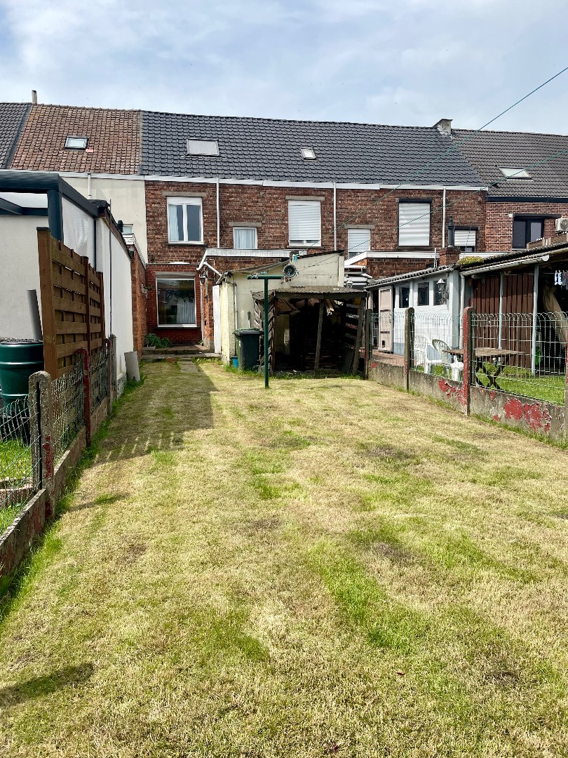 Ruime rijwoning met drie slaapkamers en tuin 