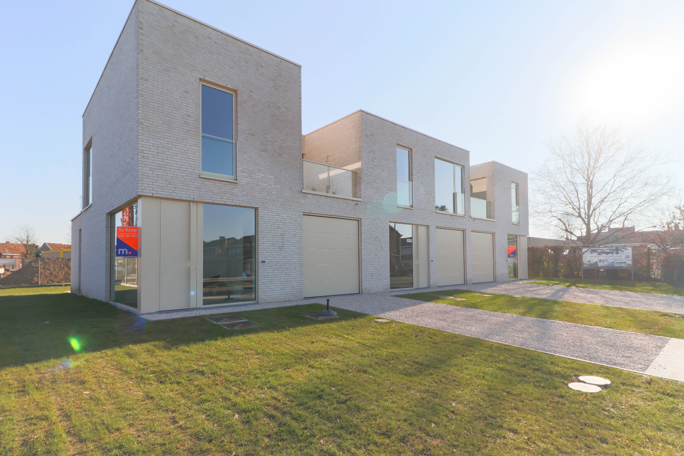 Moderne nieuwbouwwoningen met garage in groene omgeving te Kuurne 