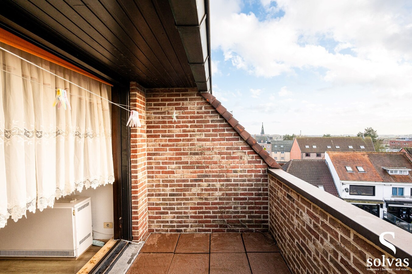 Gezellig twee slaapkamer appartement m&#233;t garage op toplocatie te centrum Aalter 